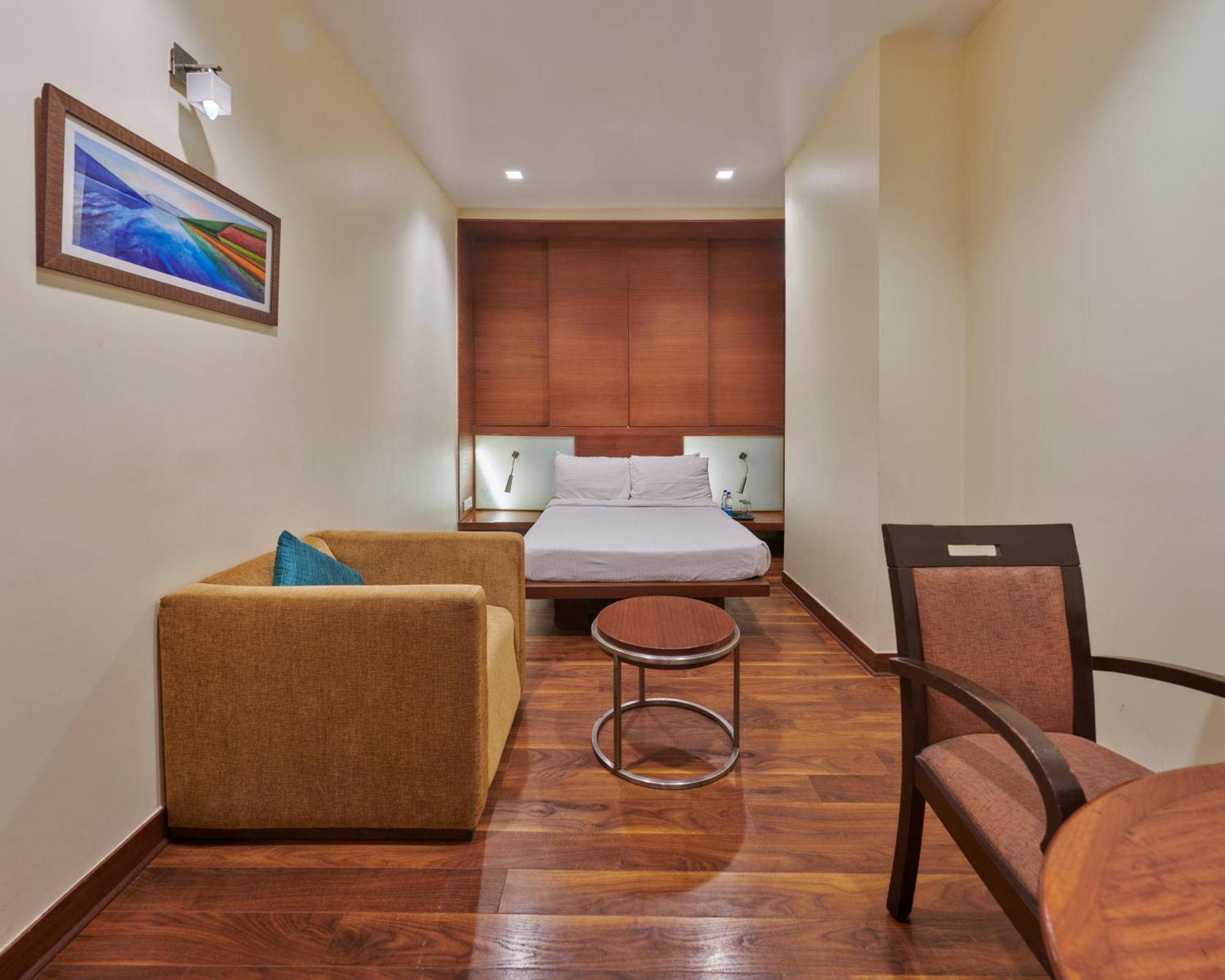 Hotel Studio Estique Pune Quarto foto