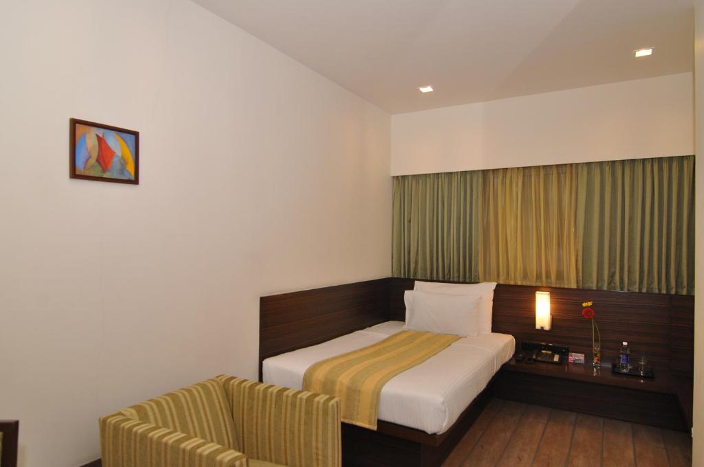 Hotel Studio Estique Pune Quarto foto